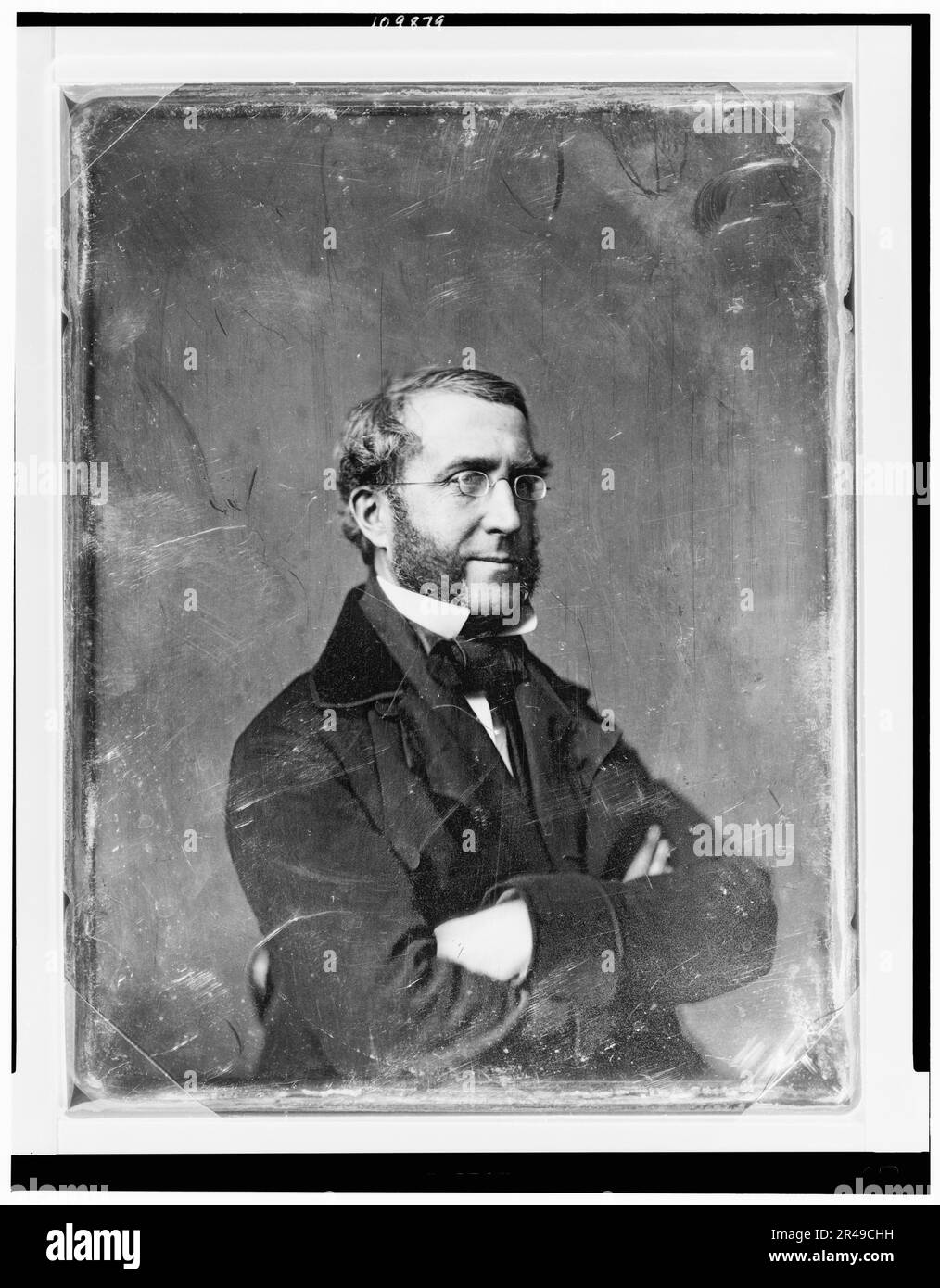 Man, possibly John H. Craig, half-length portrait, three-quarters to right, arms crossed, with side whiskers, wearing spectacles, between 1844 and 1860. Stock Photo