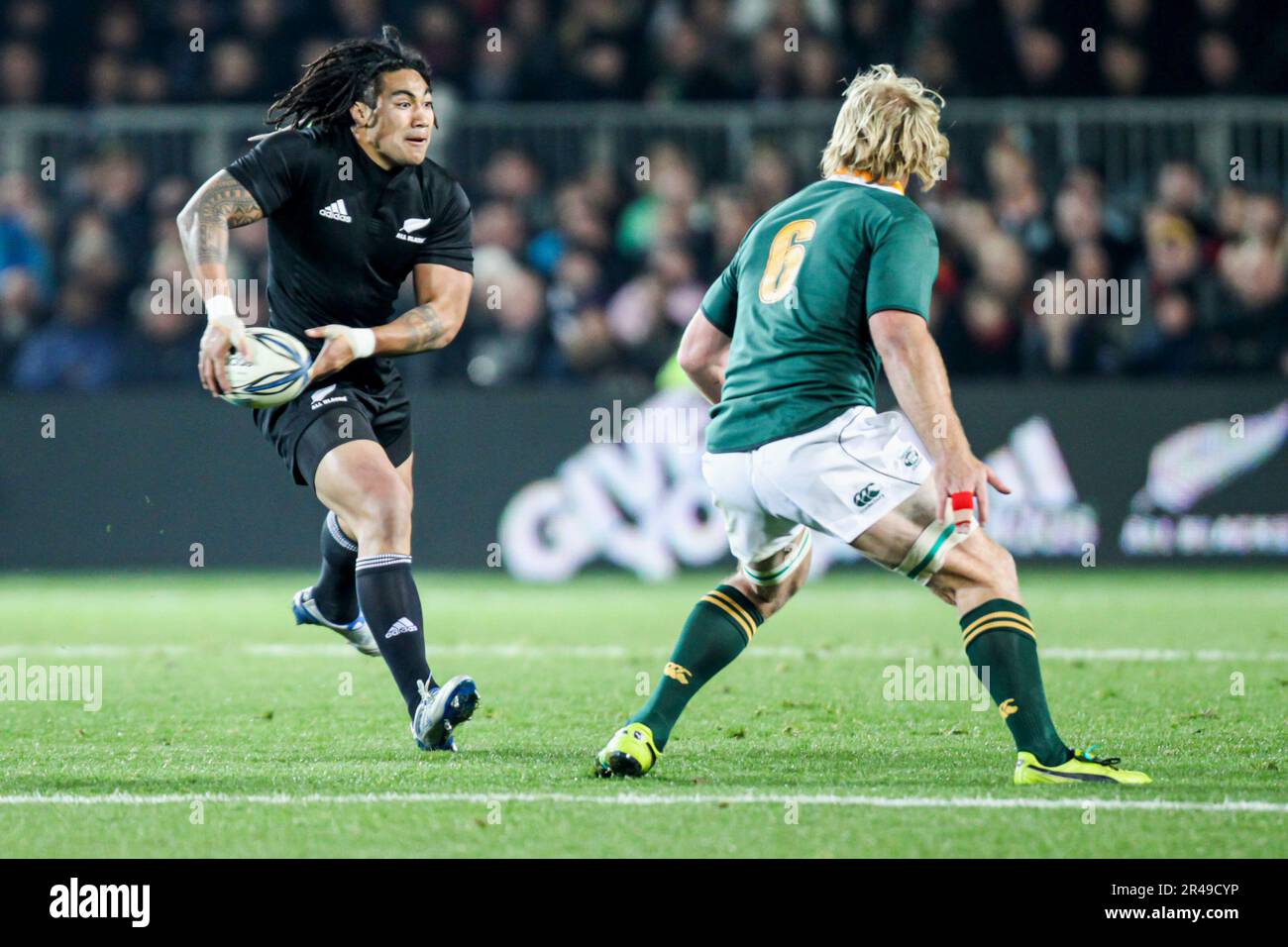 New Zealand’s All Black Ma’a Nonu is challenged by Schalk Burger whilst playing against South Africa in Auckland, New Zealand on Saturday, July 10, 20 Stock Photo