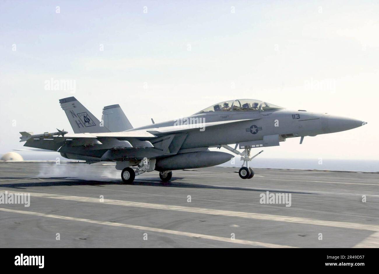 US Navy An F-A-18F Super Hornet makes an arrested landing on the flight ...