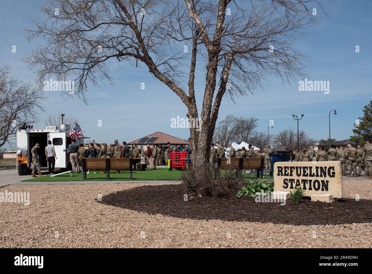 Team McConnell Airmen order and eat food at the grand opening for the