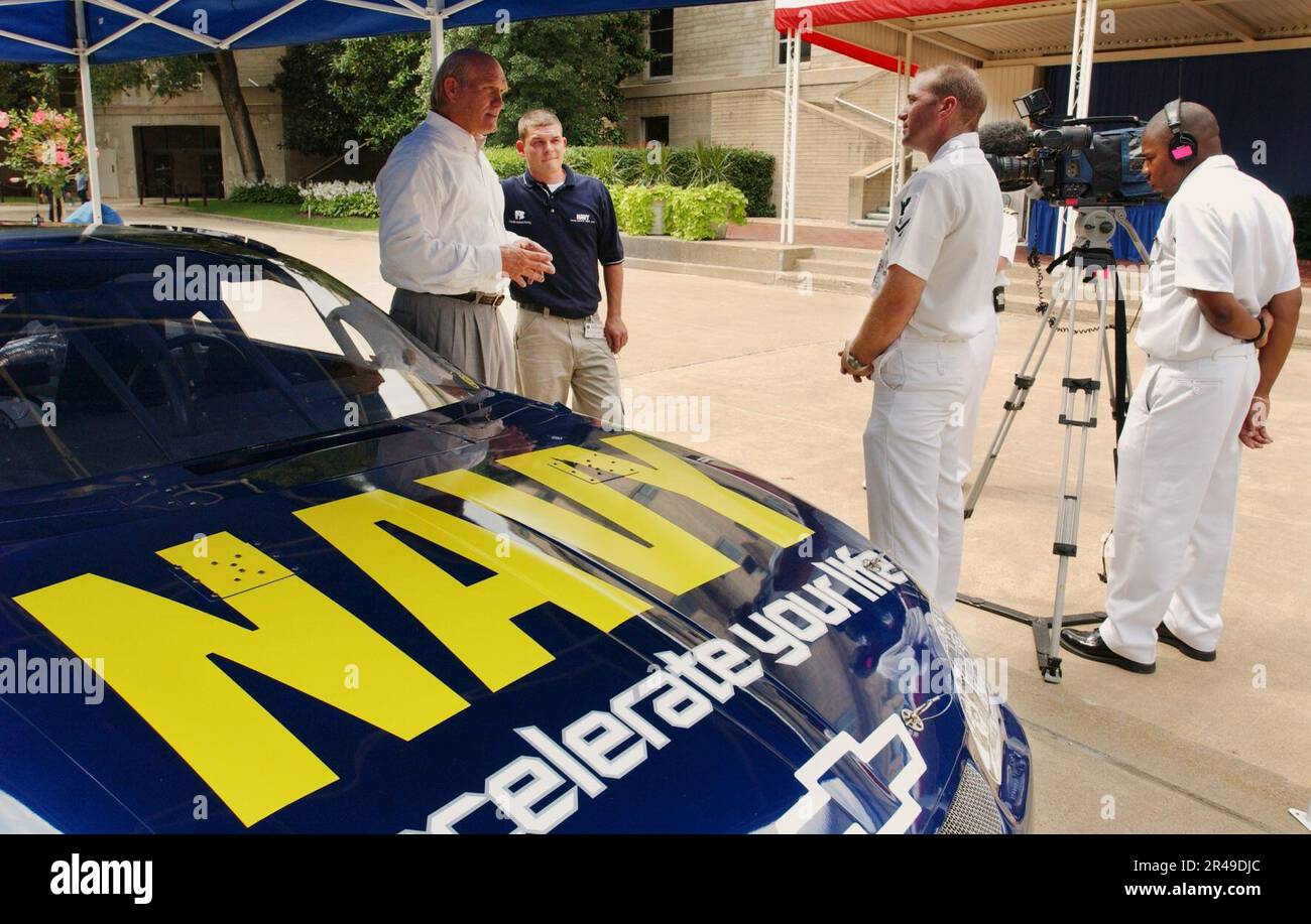 US Navy National Football League (NFL) Hall of Fame quarterback, Terry Bradshaw (left) and NASCAR Busch Series Driver Casey Atwood are interviewed by Navy Marine Corps News Stock Photo