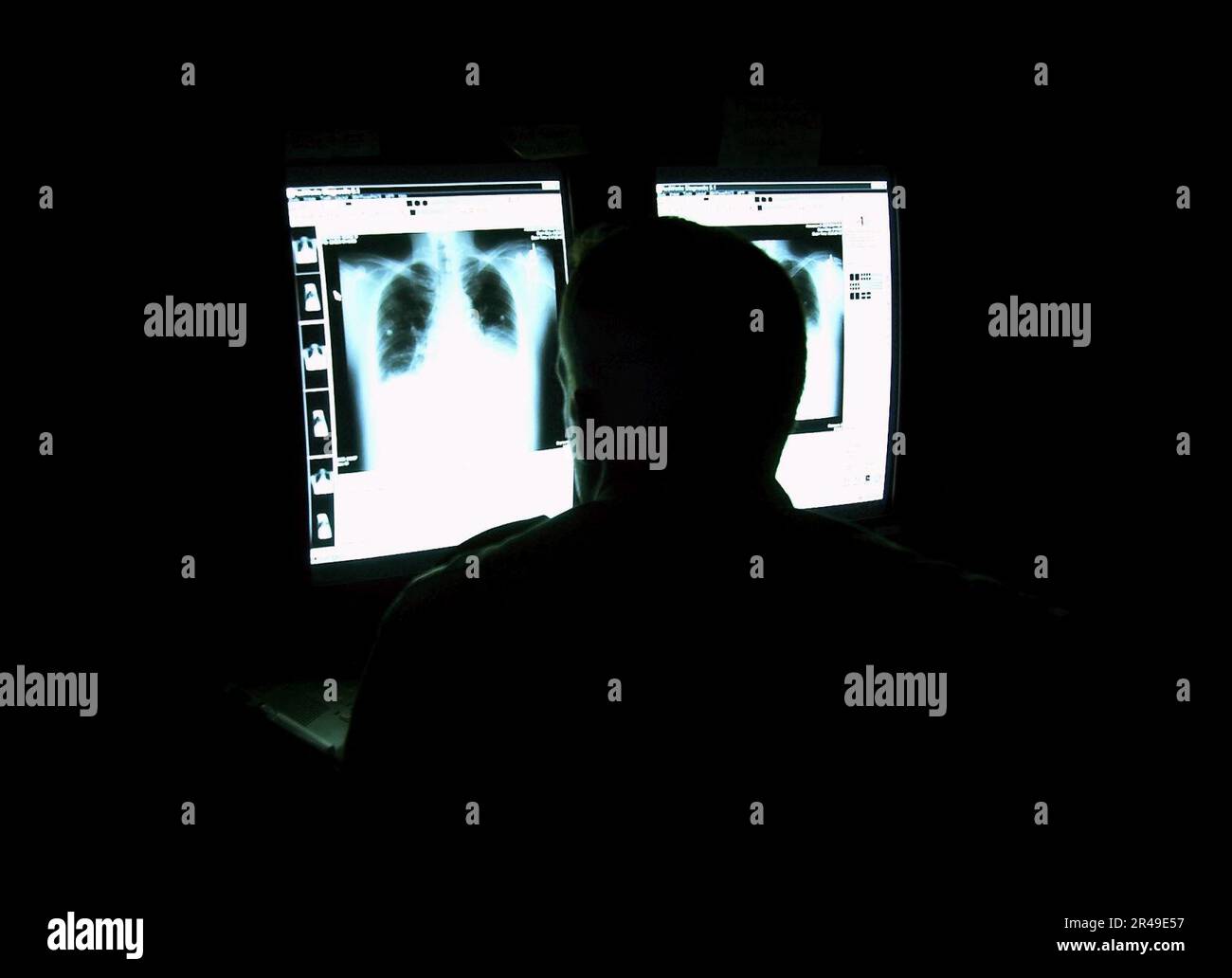 Study Rays US Navy A radiologist studies digital x-rays in a viewing room at the ...