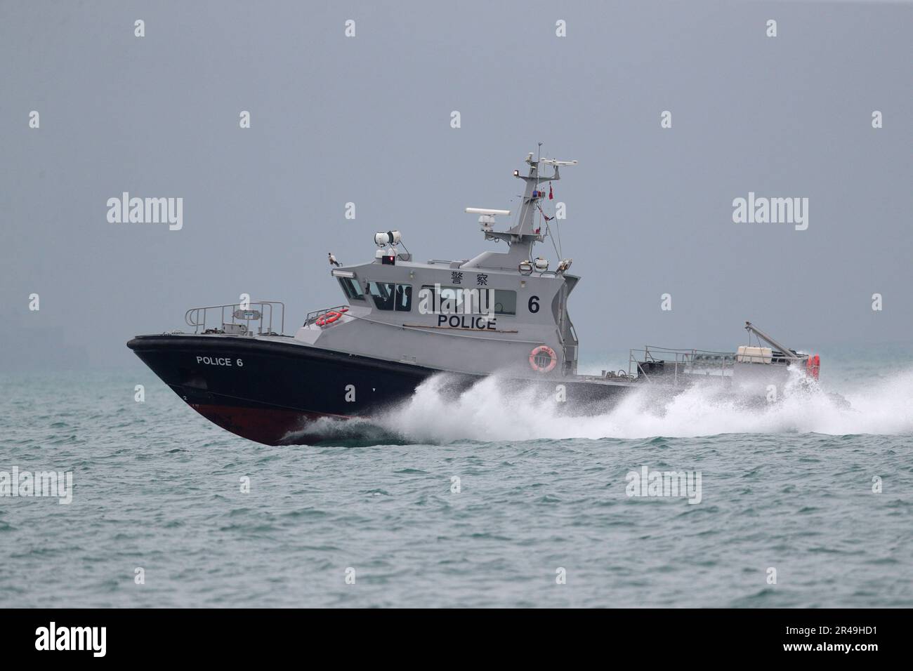 Police Launch 6, side view at speed, Tolo Harbour, Hong Kong Stock Photo