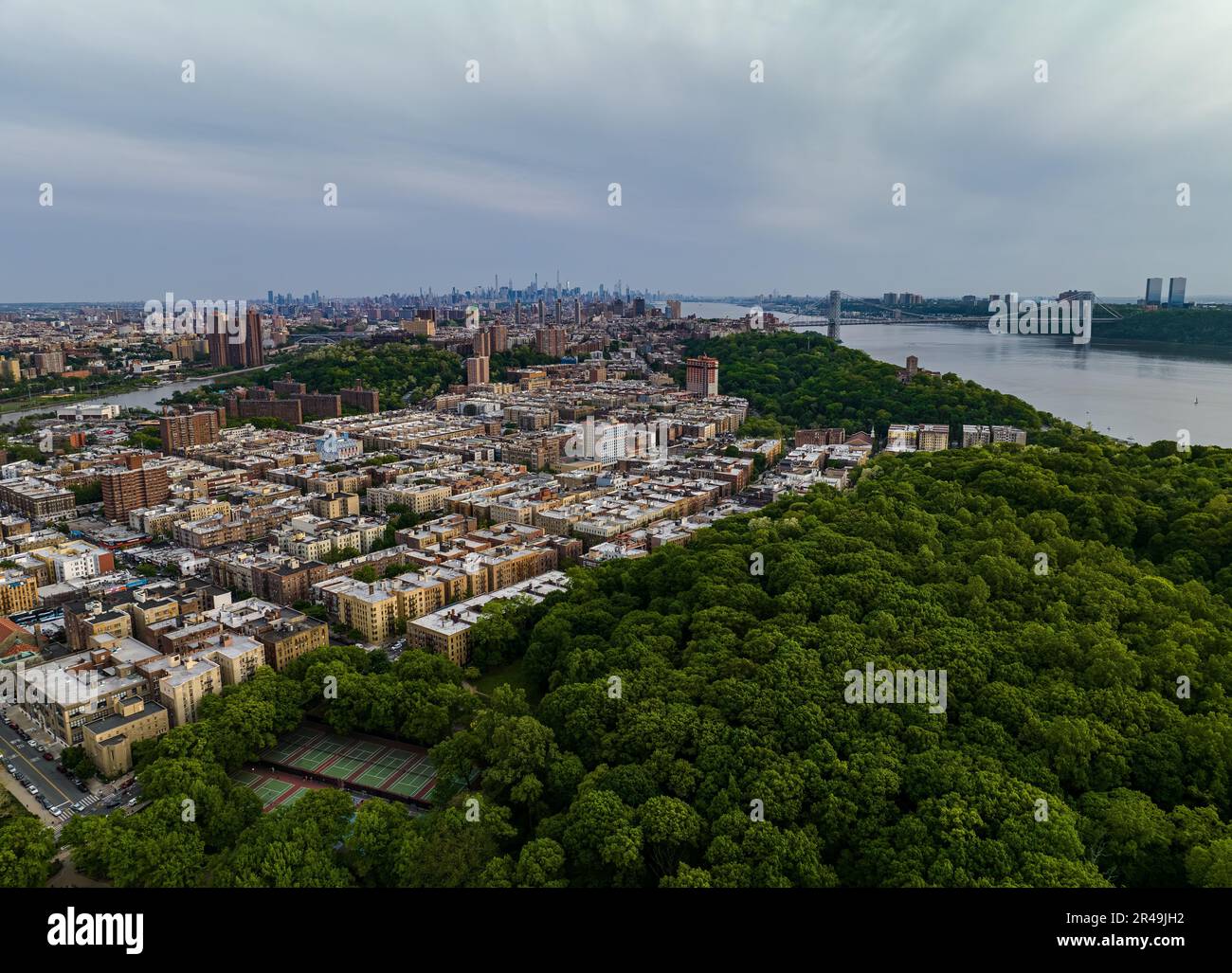 An aerial perspective of the iconic New York City skyline in the far ...