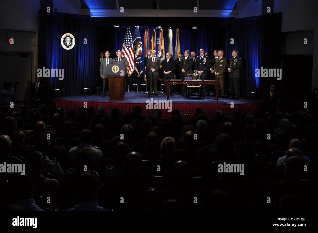 US Navy President George W. Bush makes remarks before signing the ...