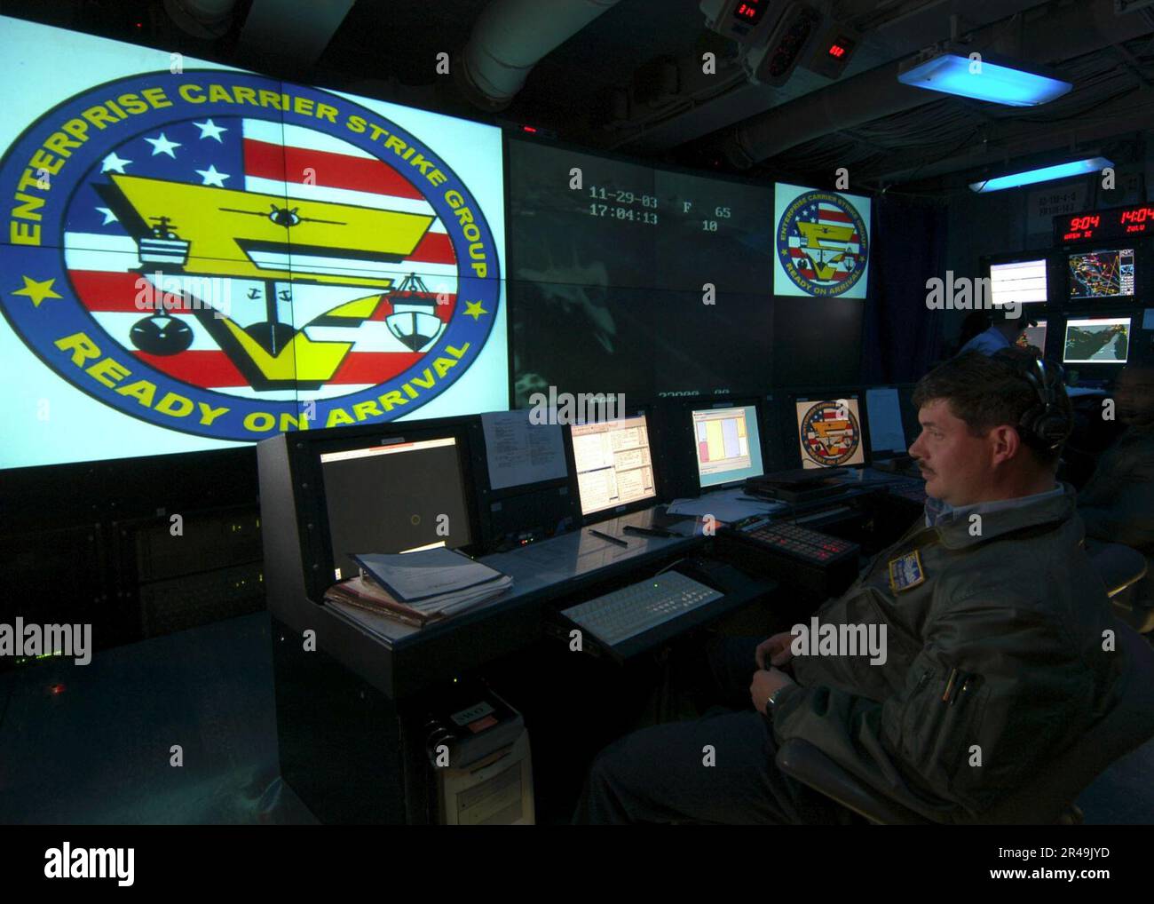 US Navy Operations Specialist 1st Class monitors surface contacts in