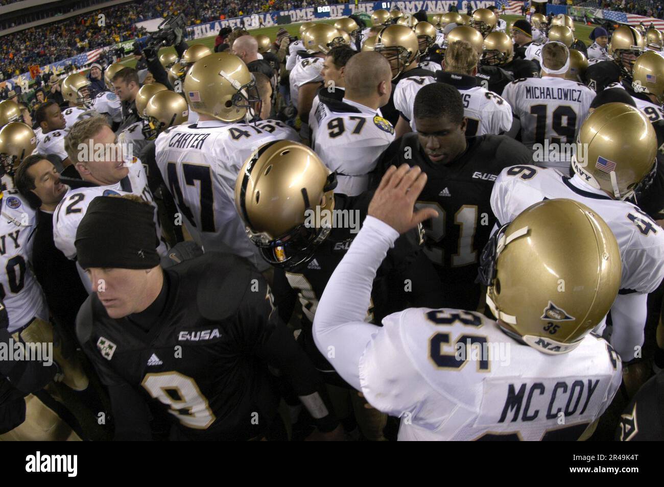 US Navy Army And Navy Football Players Meet In The Center Of The Field us-navy-army-and-navy-football-players-meet-in-the-center-of-the-field