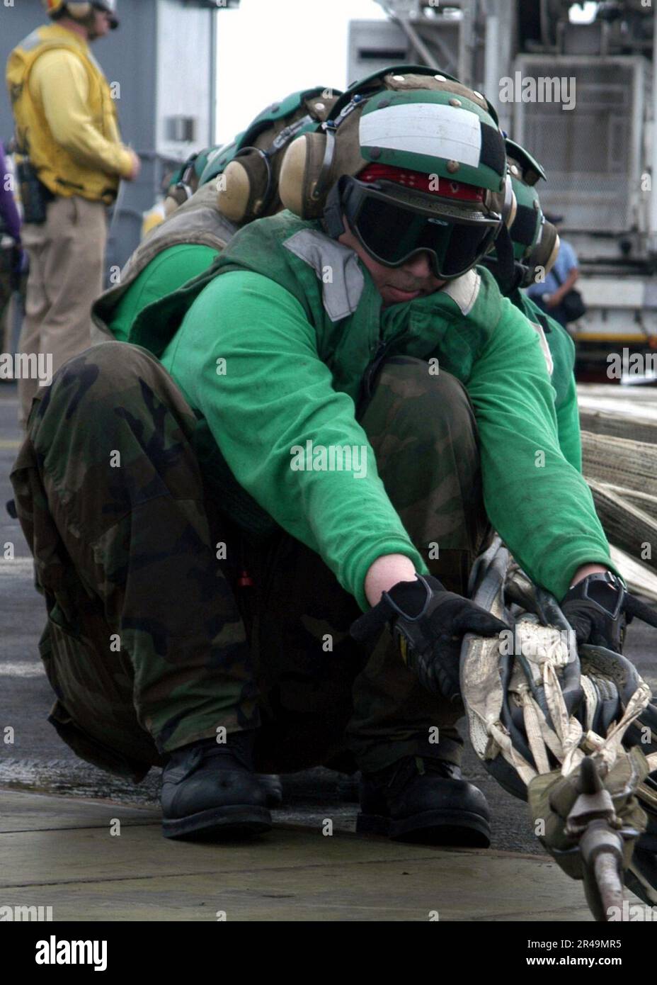 US Navy Sailors assigned to the air department aboard USS Carl Vinson ...