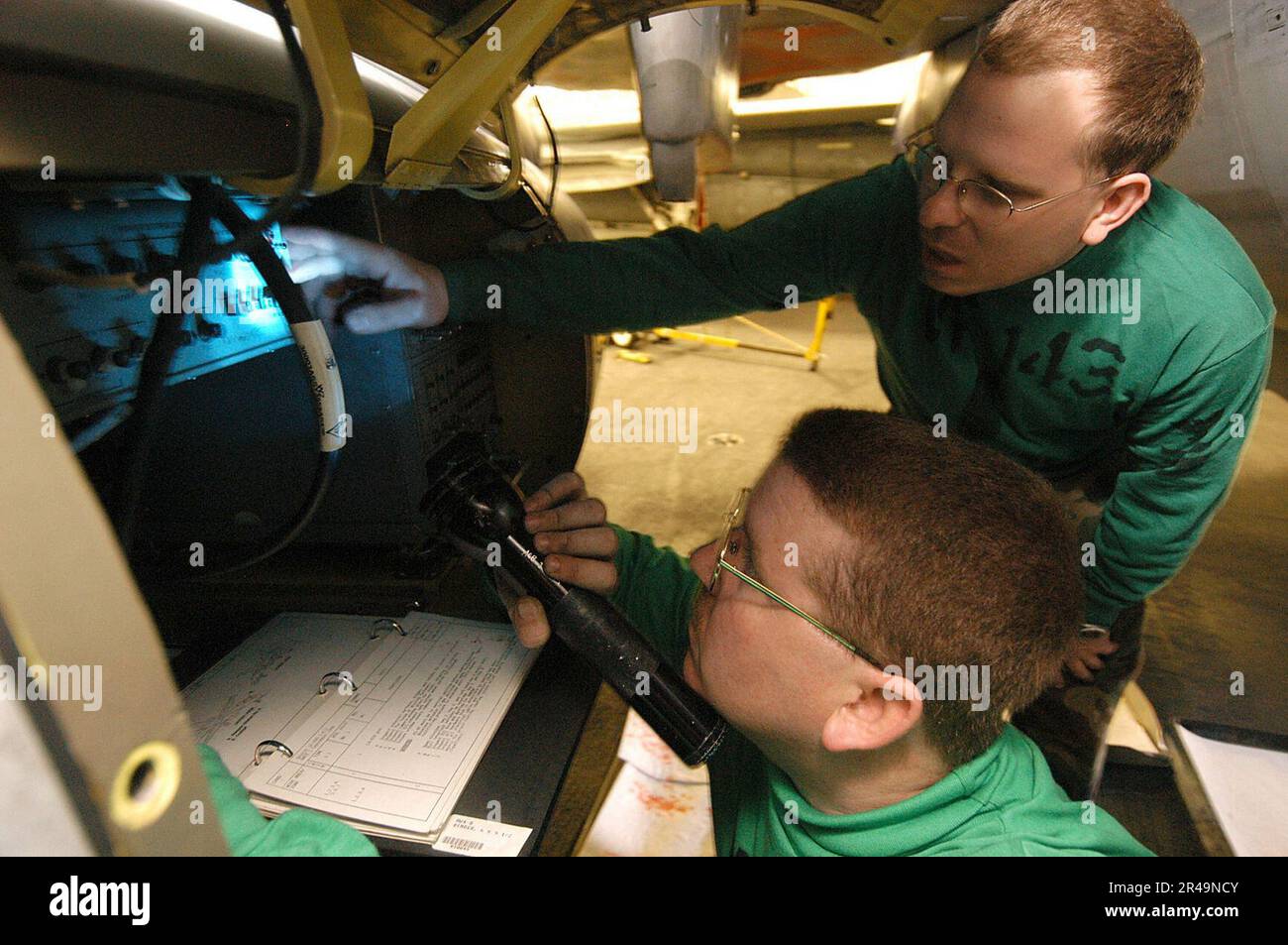 US Navy Photographer's Mate 1st Class and Photographer's Mate 1st Class