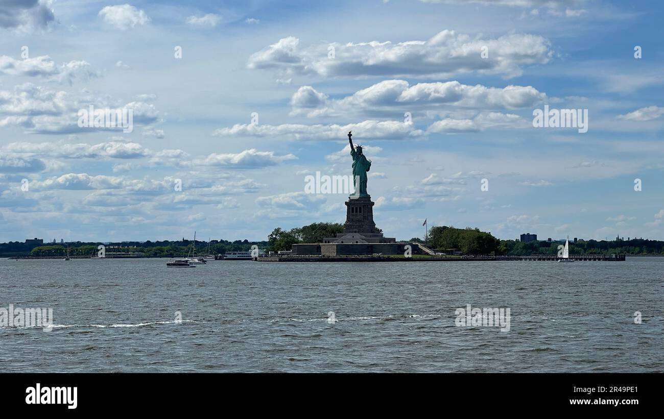 The iconic Statue of Liberty stands majestically atop Liberty Island