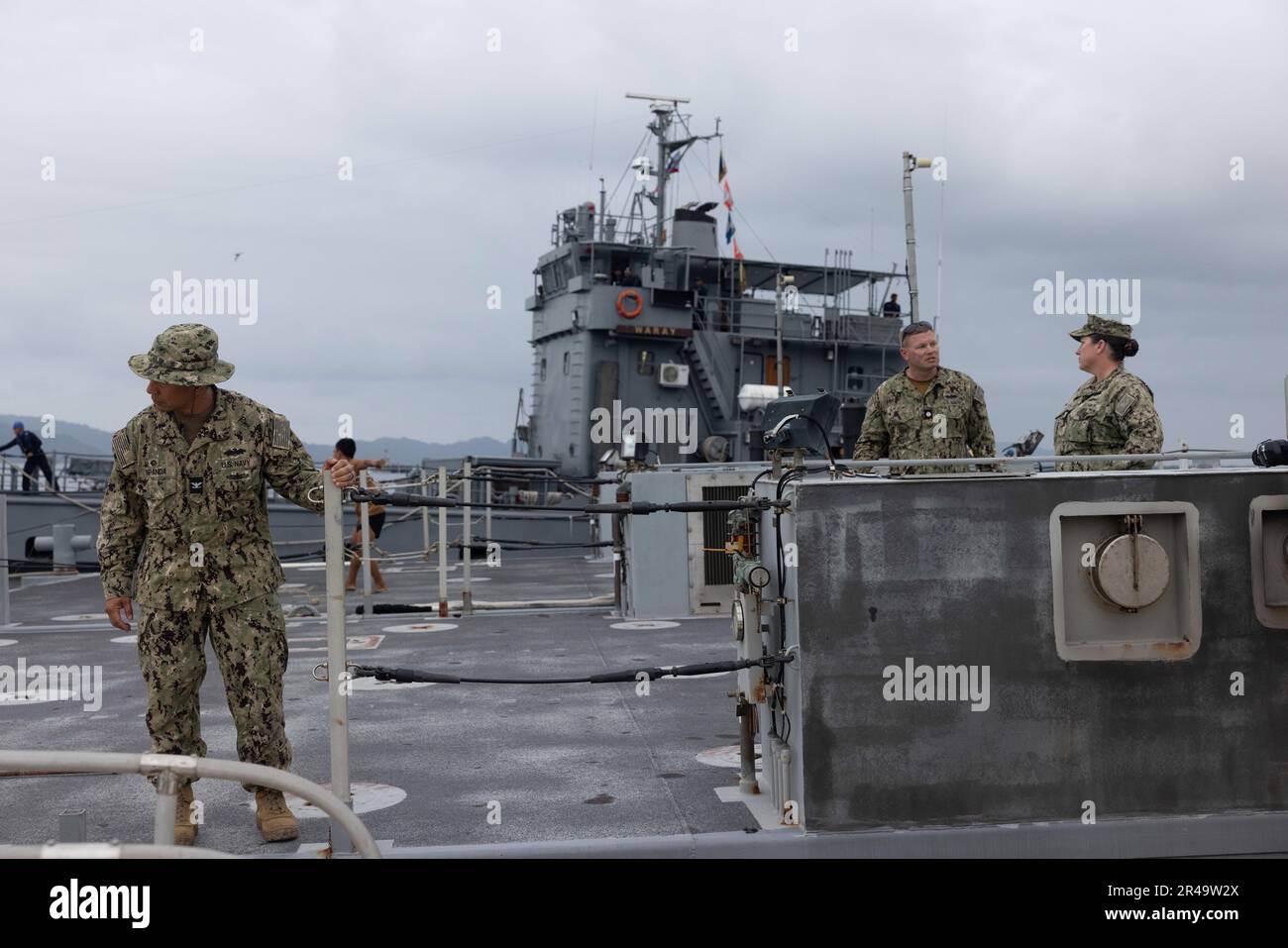 U.S. Navy Sailors stand on a Navy Roll-On/Roll-Off Discharge Facility as Philippine BRP Waray LC-288 moors next to it during a combined joint logistics over-the-shore offload in preparation for Balikatan 23 at Camp Agnew, Casiguran, Philippines, April 6, 2023. Balikatan is an annual exercise between the Armed Forces of the Philippines and U.S. military designed to strengthen bilateral interoperability, capabilities, trust, and cooperation built over decades shared experiences. Stock Photo