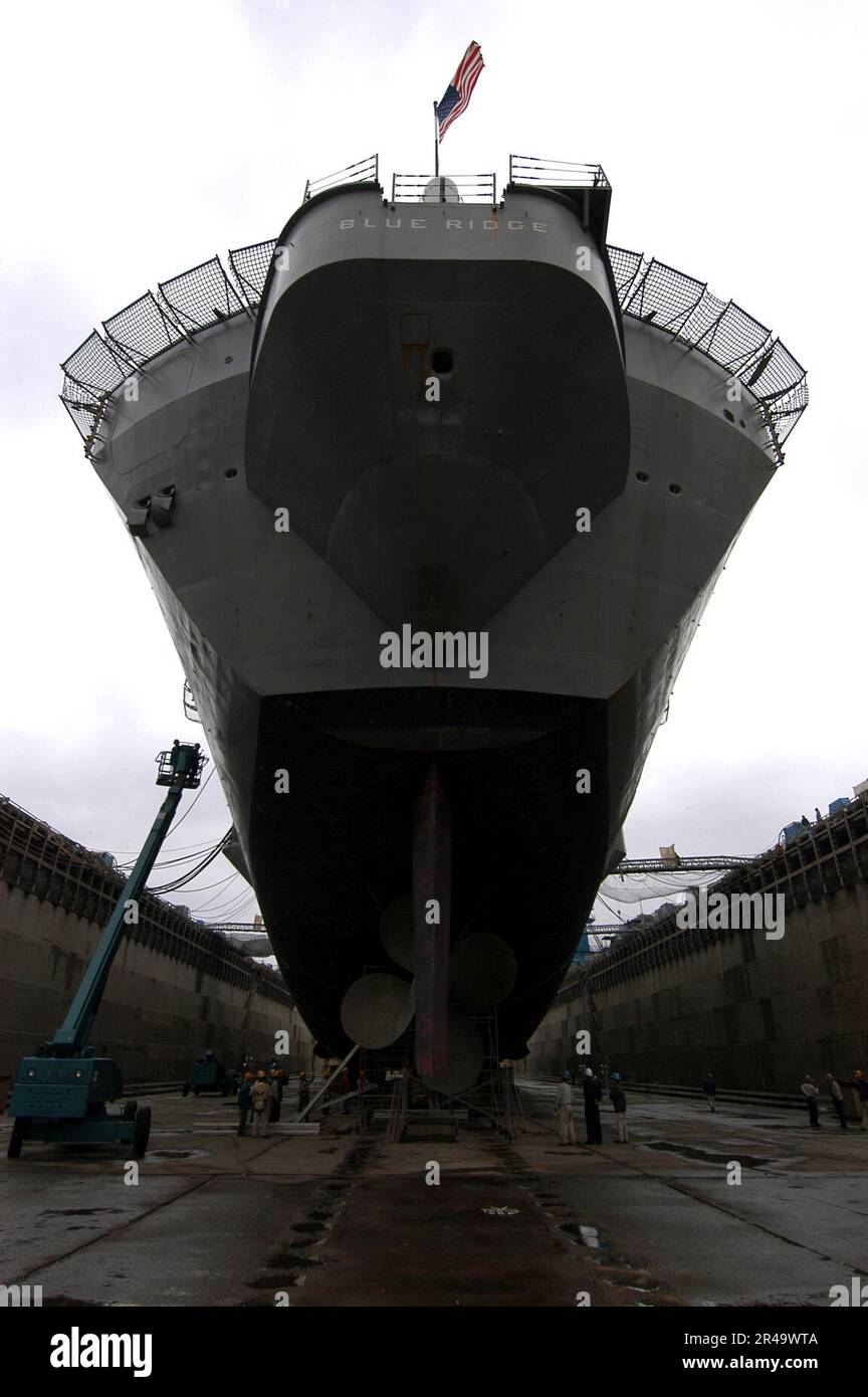US Navy USS Blue Ridge rests in the Naval Ship Repair Facility dry dock ...