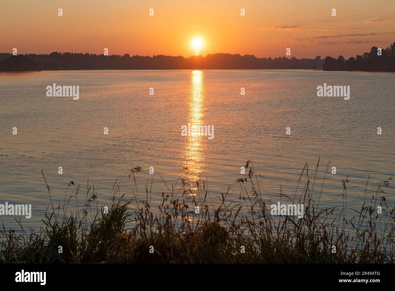 Bright July sunrise on the Volga river. Tver region, Russia Stock Photo