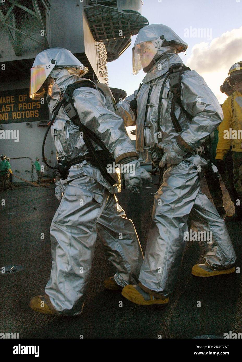 US Navy Sailors assigned to Air Department's Crash and Salvage team ...