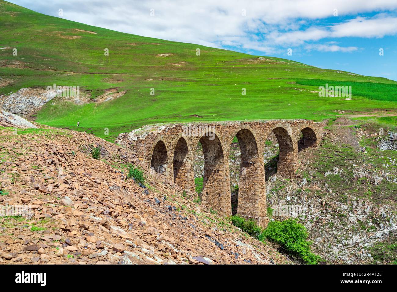 An ancient stone bridge in the suburbs of the city of Gadabay, built by ...