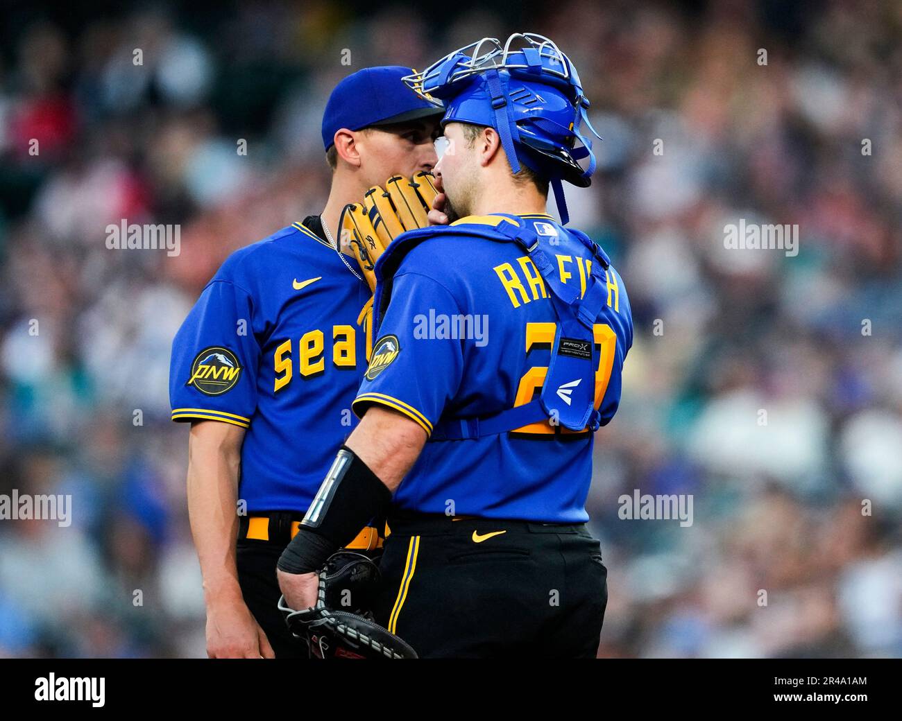 Seattle Mariners starting pitcher Kirby talks with catcher Cal