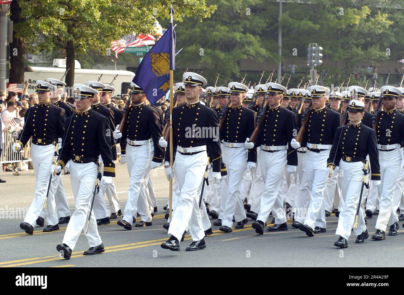 US Navy U.S. Navy Midshipmen from the U.S. Naval Academy participate in the precession, carrying the flag-draped casket of former President Ronald Reagan Stock Photo