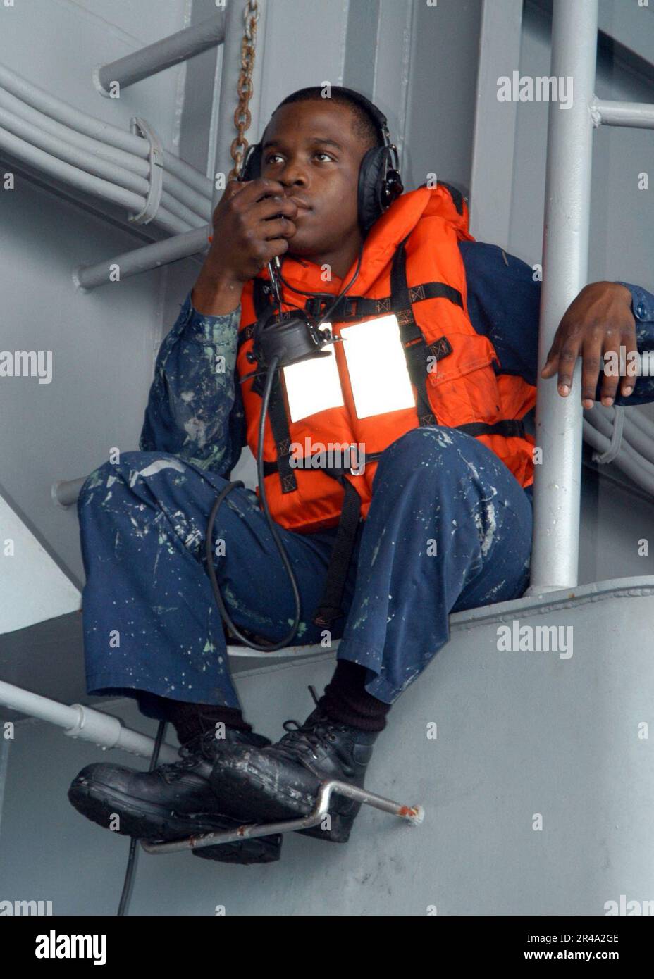 Us Navy Raft US Navy Seaman relays a message to a life raft coxswain during a Search ...