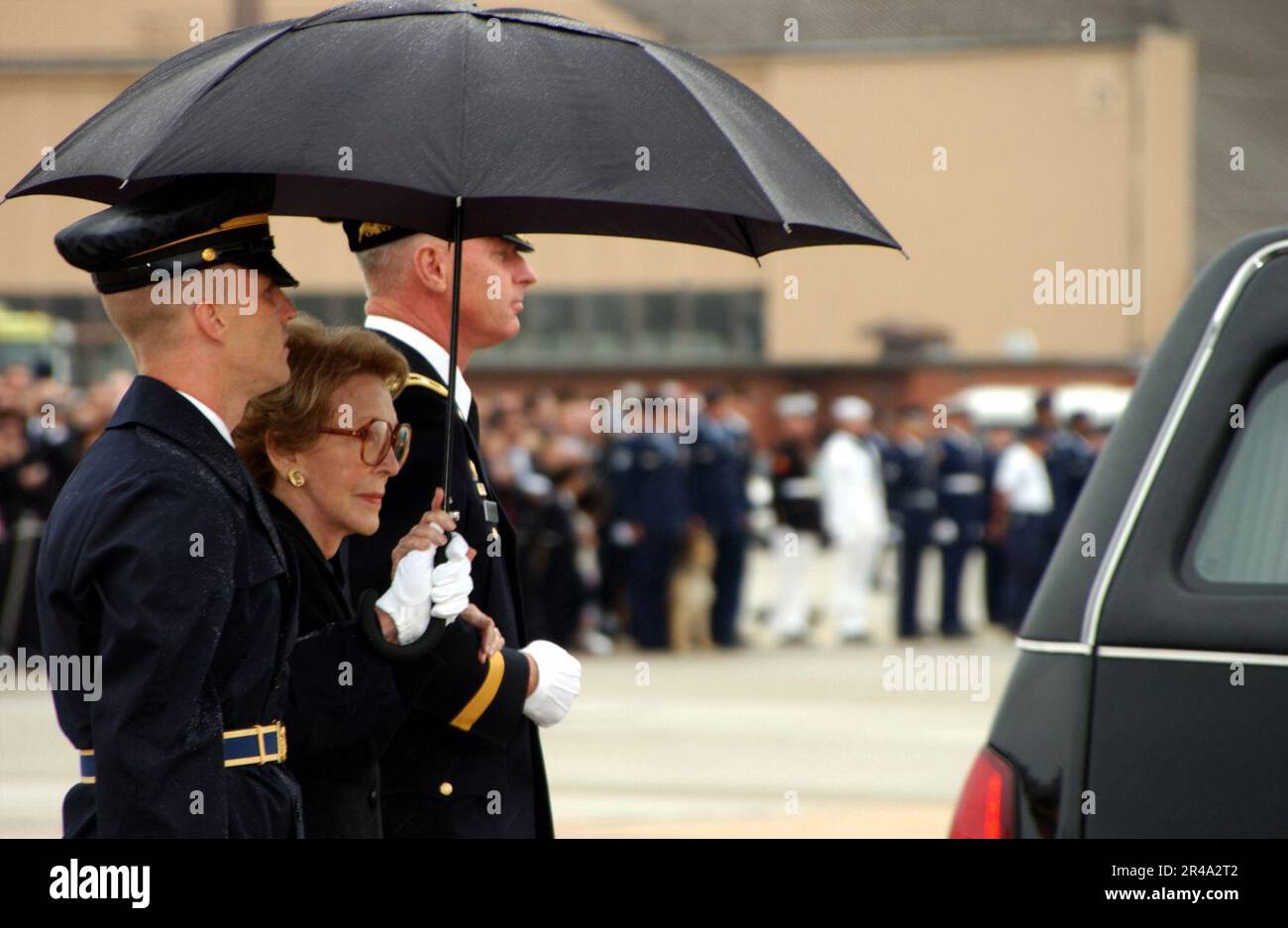 US Navy Former First Lady Nancy Reagan is escorted during the departure ...