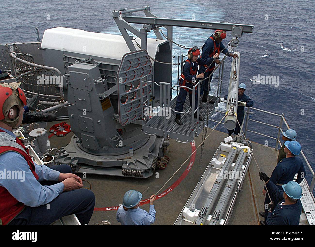US Navy Sailors from Combat Systems department upload a Rolling