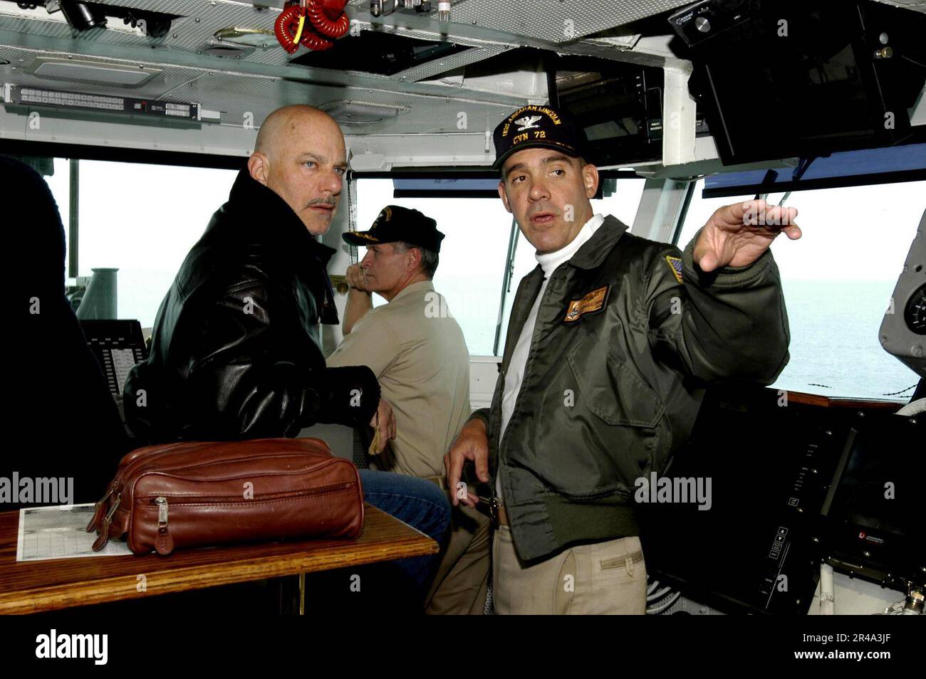US Navy Director Rob Cohen visits with Commanding Officer, USS Abraham Lincoln (CVN 72), Stock Photo