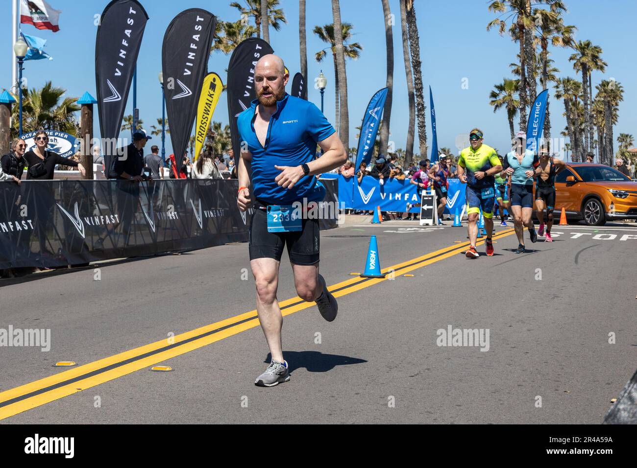 Participants compete in the run portion of the Ironman 70.3 Oceanside