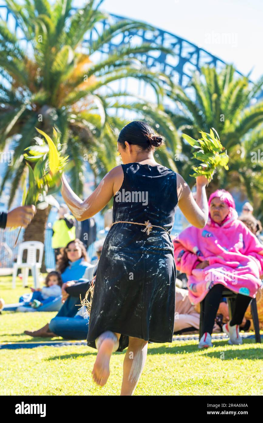 Sydney Australia 27 May, 2023: As part of National Reconciliation Week, a Sorry Day gathering was held today on the Tarpeian Precinct in the Botanical Gardens near the Sydney Opera House. People gathered to remember the stolen generations (of Aboriginal peoples) and create healing for survivors. Sponsored by the Coota Girls Aboriginal Corporation, the event included music crafts and bush foods. With the Sydney Harbour Bridge in the background, the Buuja Buuja Butterfly Dance Group performed at the opening of the gathering. Credit: Stephen Dwyer / Alamy Live News Stock Photo