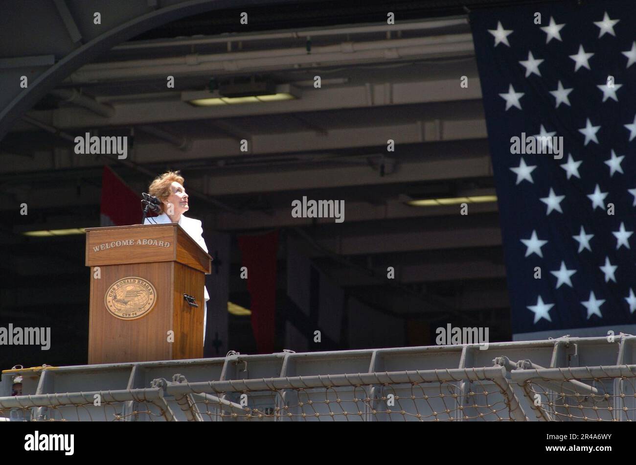 US Navy Former First Lady Nancy Reagan glances up at her husband's ...