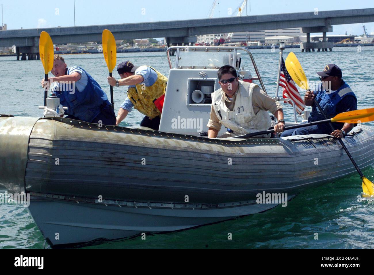 US Navy Sailors attached to the guided missile destroyer USS Paul ...
