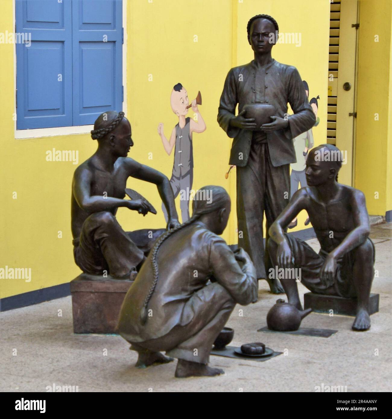 The bronze statues of people in Singapore Stock Photo Alamy