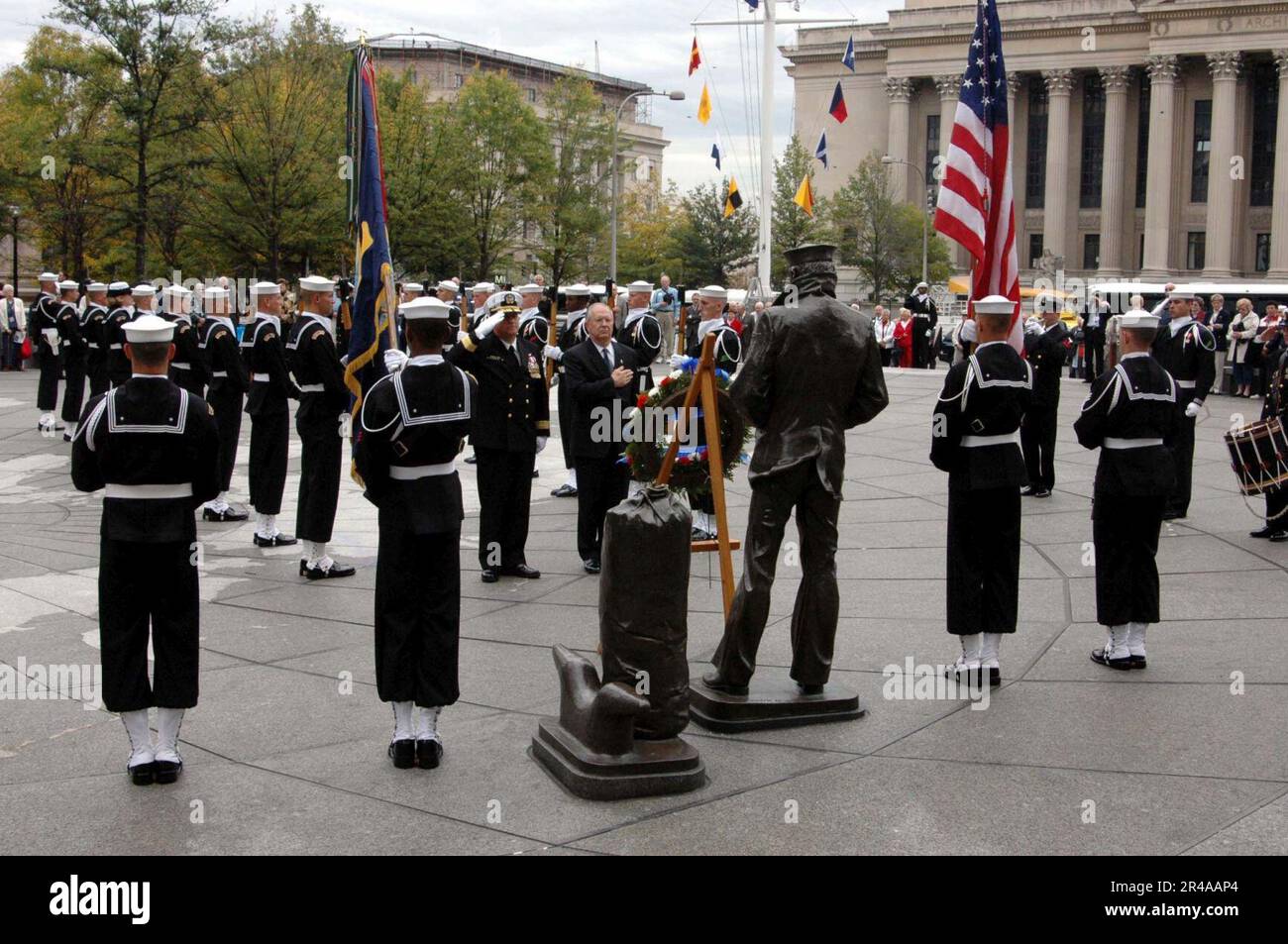 US Navy Commander, Naval District Washington, Rear Adm. Jan C. Gaudio, and President and CEO of the U.S Navy Memorial Foundation, Retired Rear Adm. Pierce J. Johnson, place a wreath in front of The Lone Sailo Stock Photo