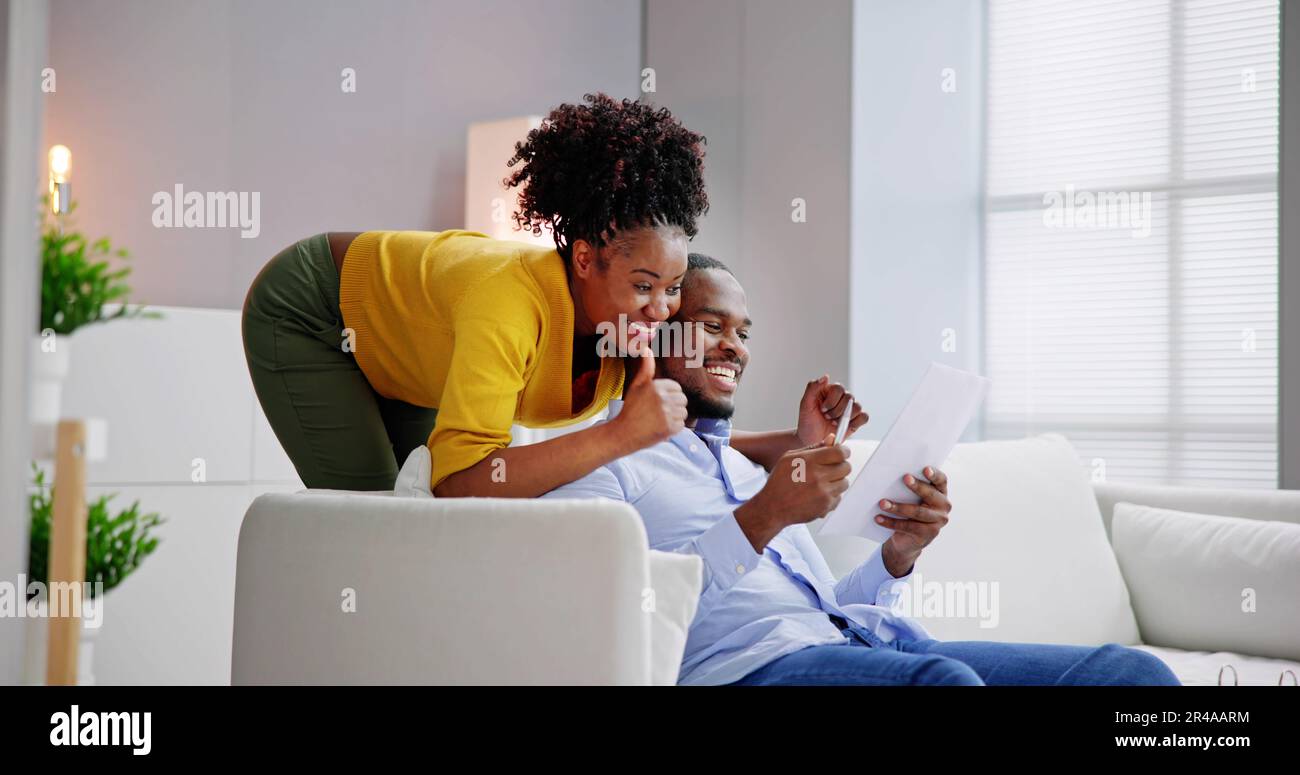 Reading letter at home hi-res stock photography and images - Alamy
