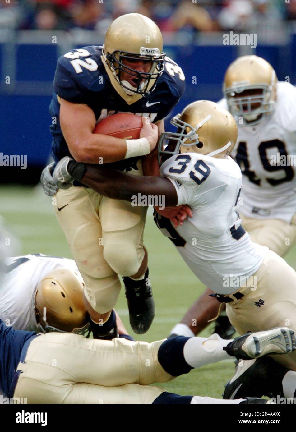 us-navy-u-s-naval-academy-midshipman-1st-class-is-tackled-by-notre