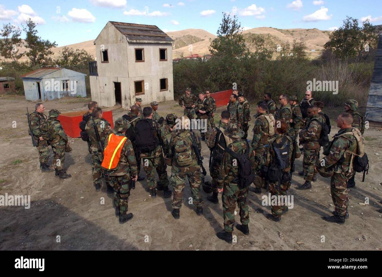 US Navy Sailors assigned to Fleet Combat Camera Group Pacific conduct a ...