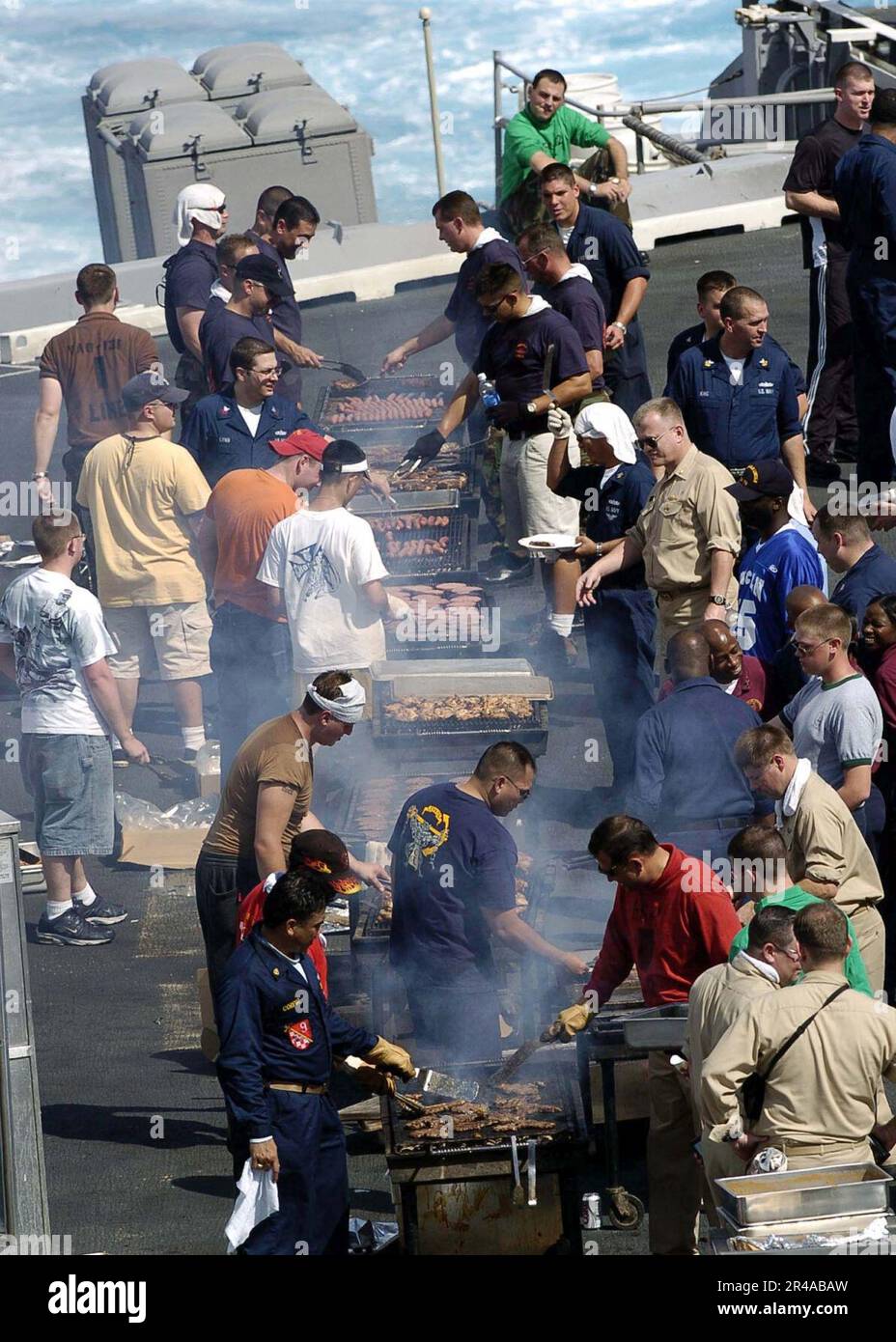 US Navy Crew members aboard the Nimitzclass aircraft carrier USS