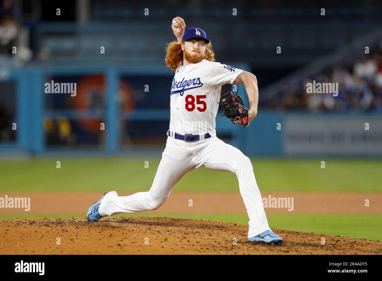 Los Angeles Dodgers pitcher Dustin May (25) throws to the plate during