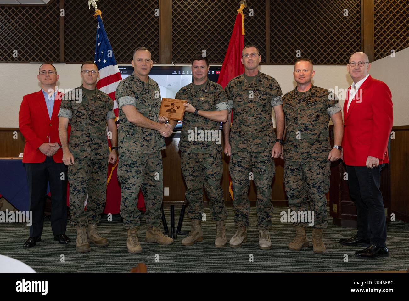 U.S. Marines from Marine Medium Tiltrotor Squadron (VMM) 265 accept a ...