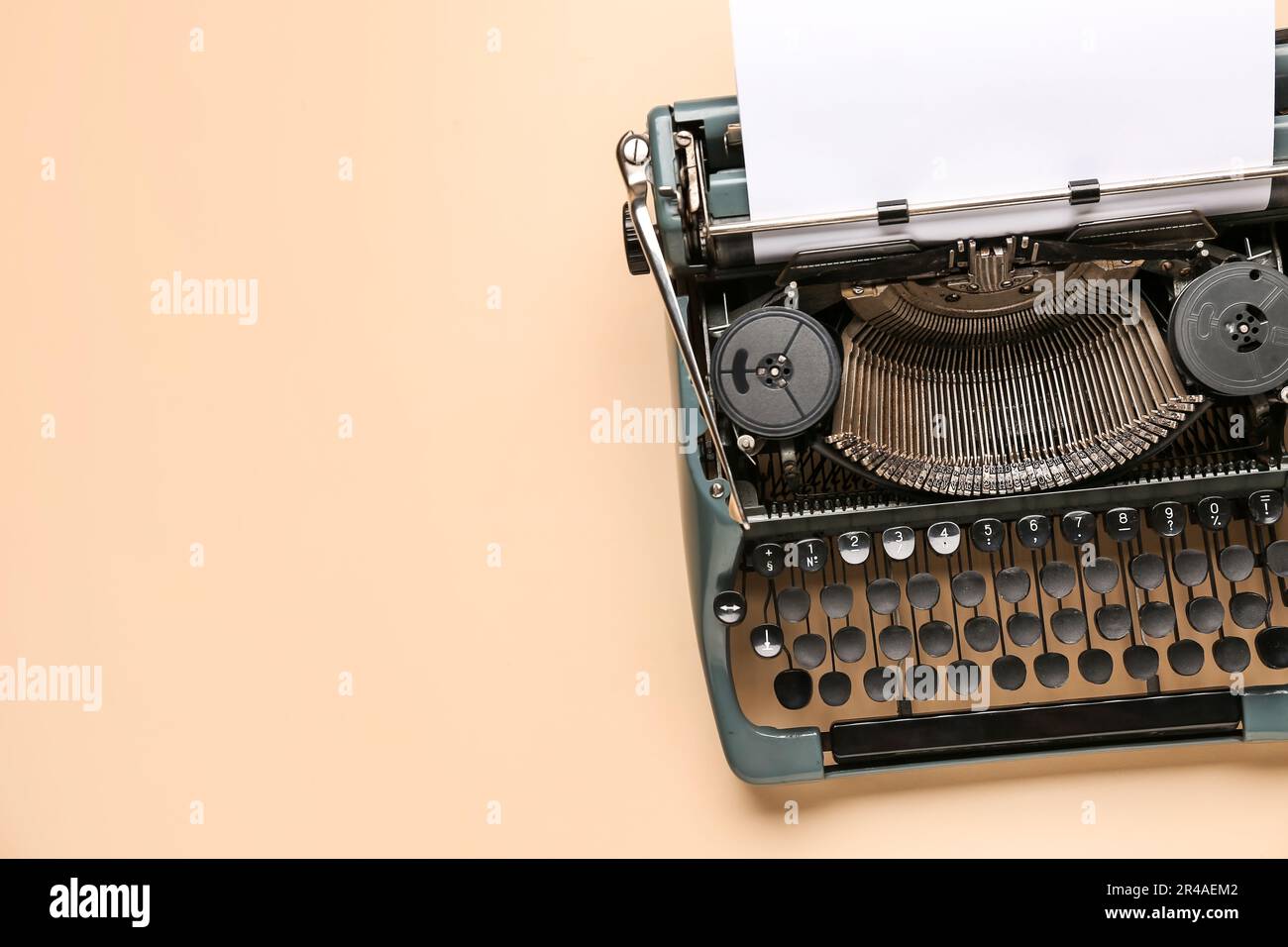 Vintage typewriter with a blank piece of paper Stock Photo - Alamy