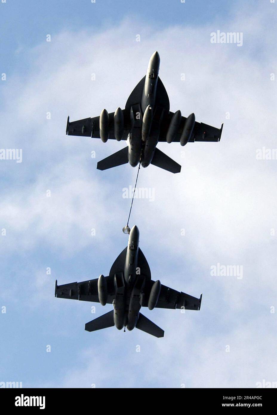 US Navy Two F A 18F Super Hornets Perform Aerial Refueling During A us-navy-two-f-a-18f-super-hornets-perform-aerial-refueling-during-a