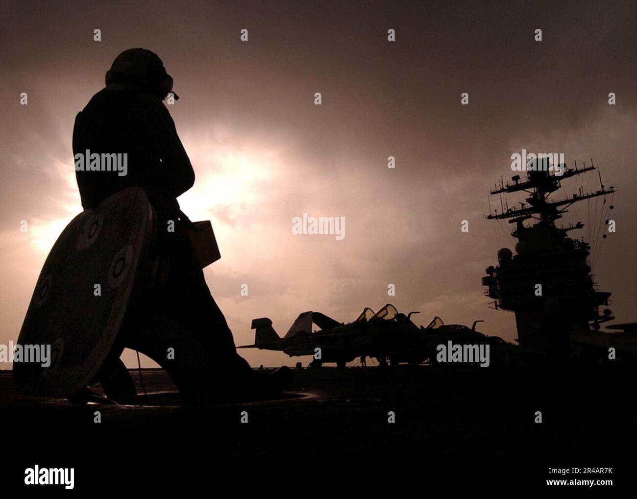 US Navy An Aviation Boatswain's Mate mans his flight quarters station