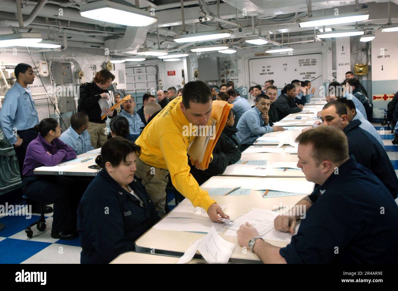 US Navy Chief Aviation Boatswain's Mate verifies the identification of