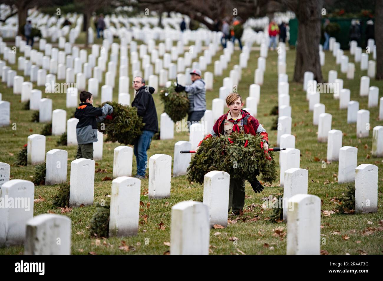 Volunteers participate in the Wreaths Across America’s cleanup day