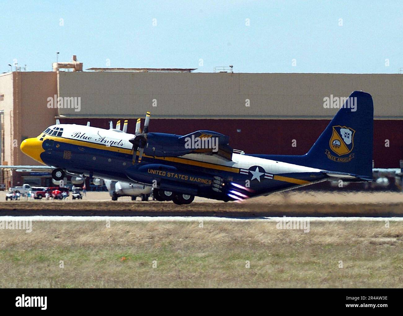 US Navy  A U.S. Marine Corps C-130 Hercules Fat Albert, assigned to the U.S. Navy Blue Angels flight demonstration team, uses Jet Assisted Take Off (JATO) bottles during takeoff. Stock Photo