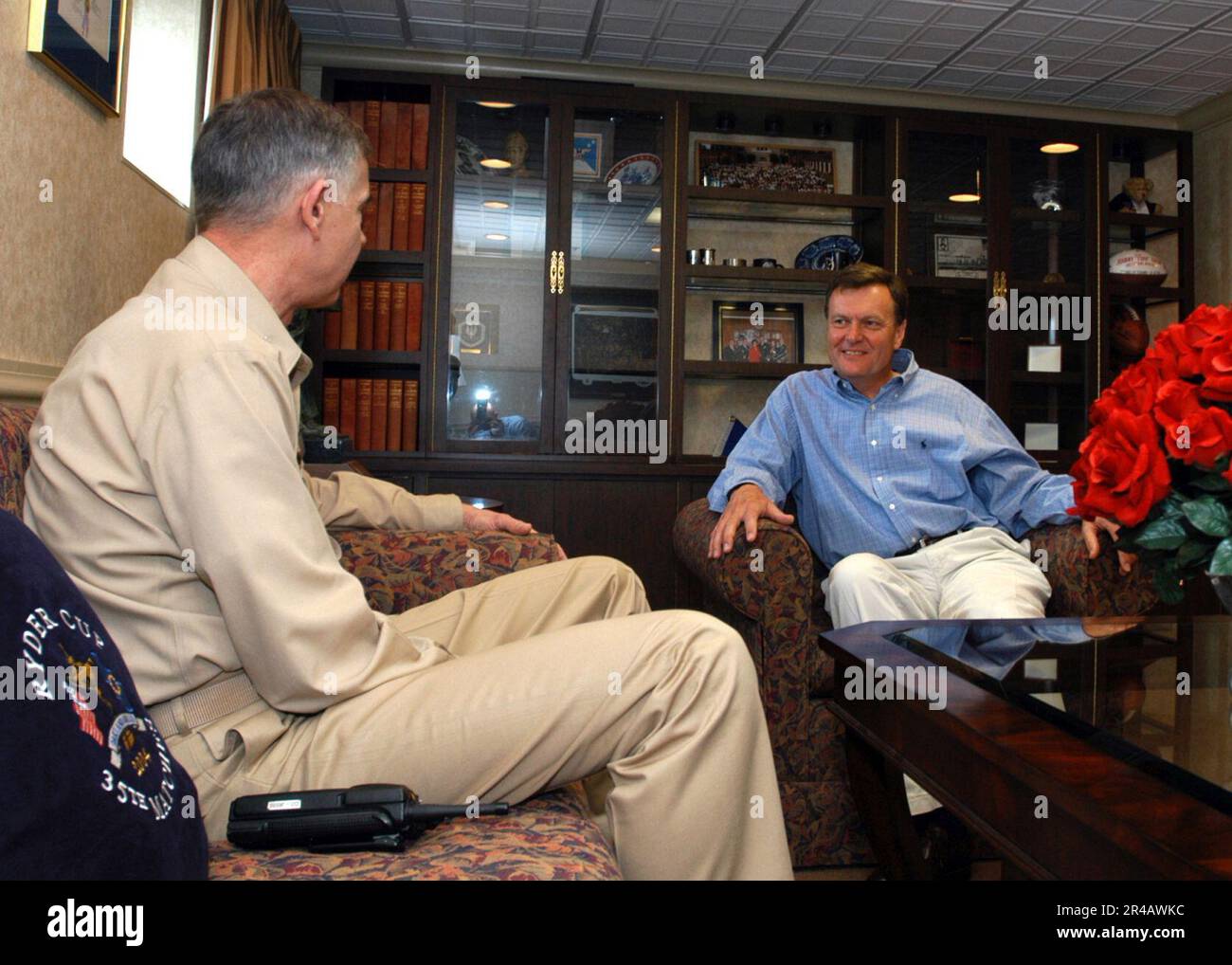 US Navy Commanding Officer, USS Theodore Roosevelt (CVN 71), Capt Turk Green speaks with the