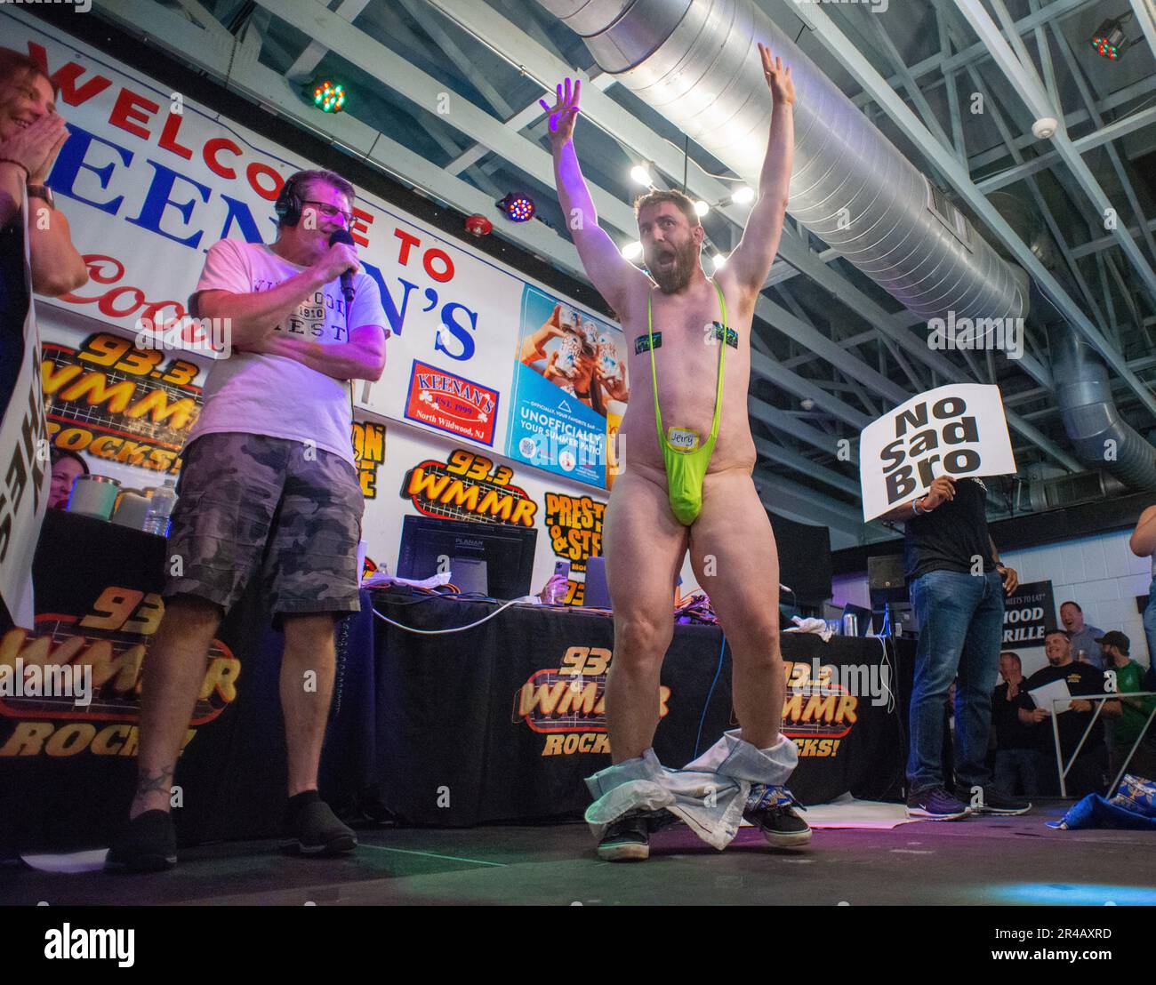 North Wildwood, United States. 26th May, 2023. A participant steps down to a mankini during the 25th annual Preston and Steve broadcast on WMMR Radio celebrating the opening of the Jersey Shore beaches this Memorial Day weekend Friday, May 26, 2023 at Keenan's North Wildwood in North Wildwood, Pennsylvania. ( Credit: William Thomas Cain/Alamy Live News Stock Photo