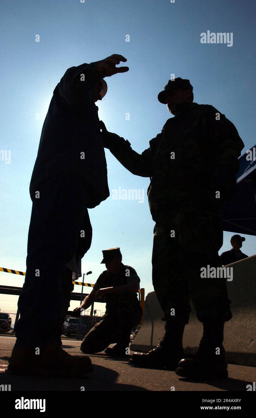 US Navy A member of the Force Protection Training Team (FPTT) runs a ...