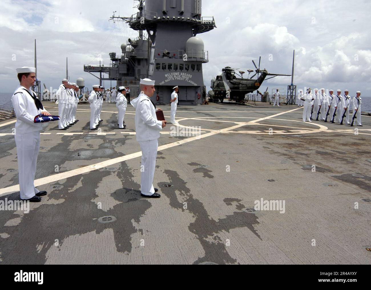 US Navy Crew members prepare to spread the cremains of a retired Navy ...