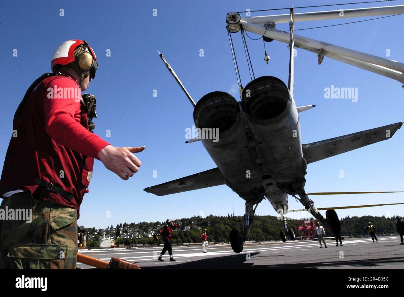 US Navy Flight Deck personnel assigned to Air Department conduct