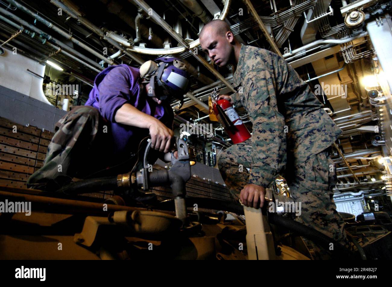 US Navy A Sailor stationed aboard the amphibious assault ship USS
