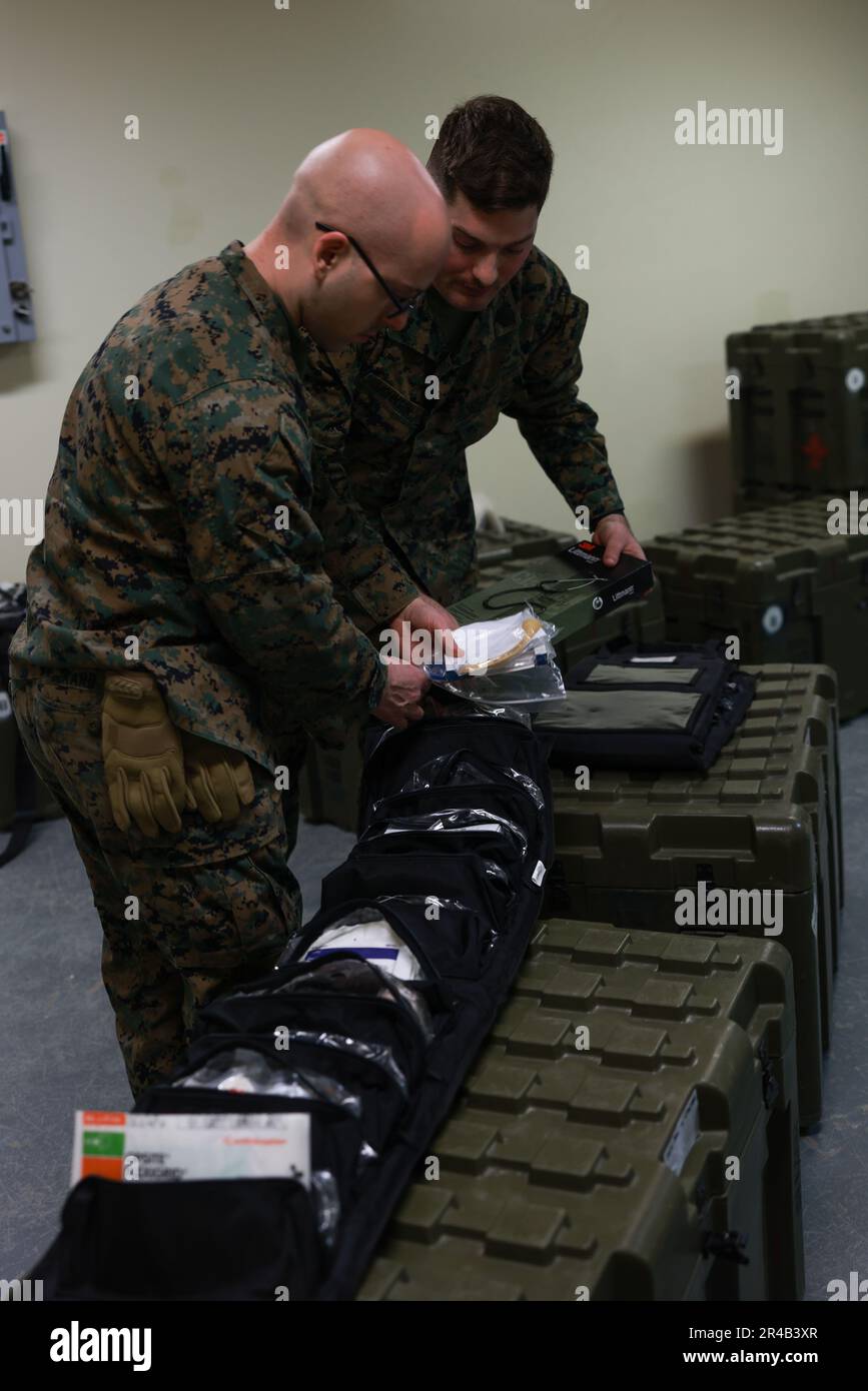 U.S. Navy HN Dennis Johnson, a hospital seaman with III Marine ...